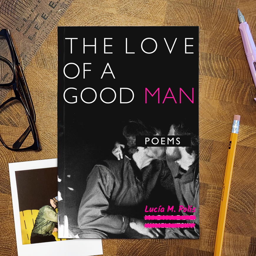 A top-down view of a wooden tabletop that has: a typographical ruler, a pair of eyeglasses, a pink fountain pen, a pencil, and a softcover copy of a book that shows two men sharing a kiss. The cover of the book states: The Love of a Good Man; poems